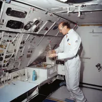 A scientist conducting experiments in microgravity